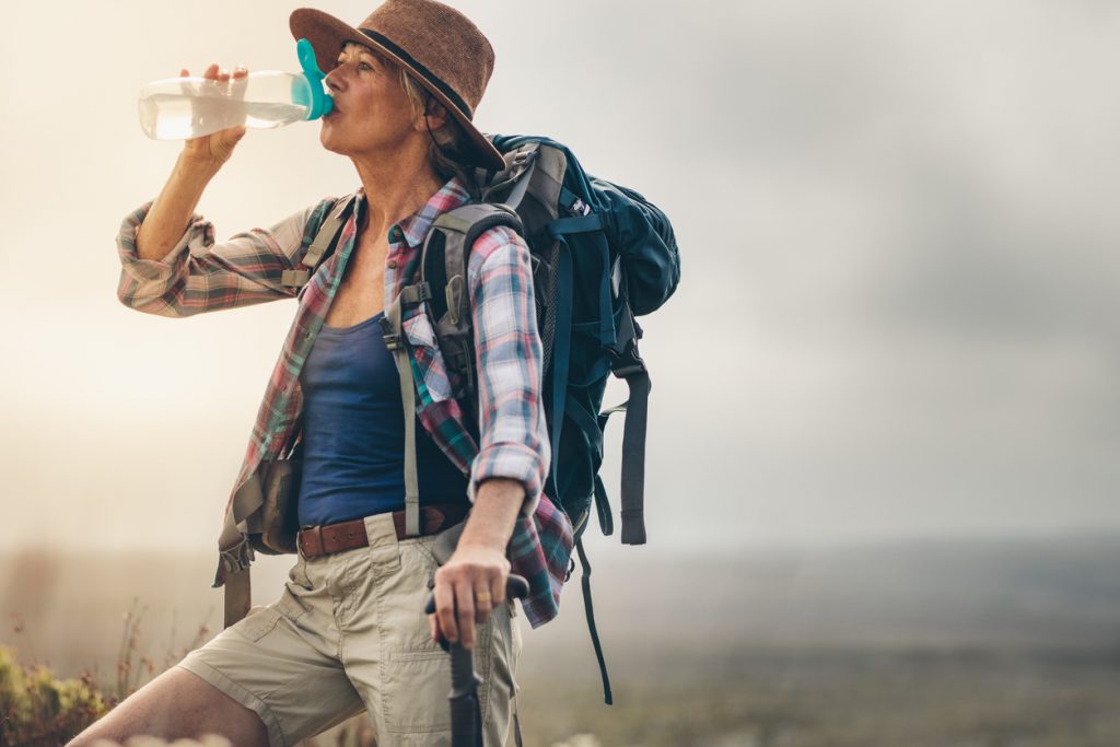 Hiker drinking water