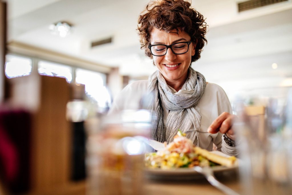 woman eating a meal